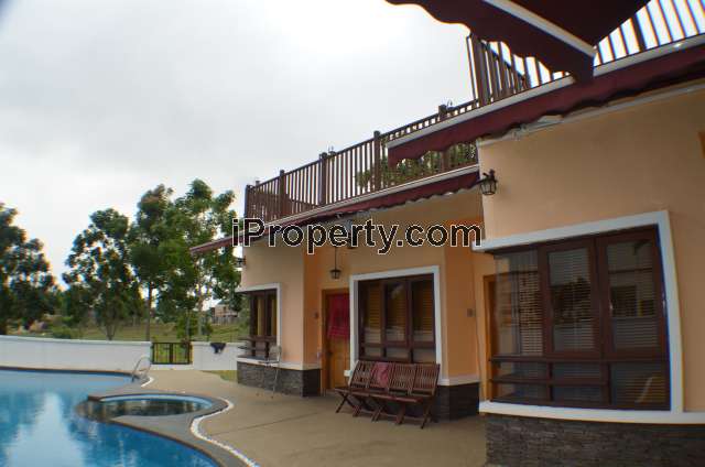 GUEST ROOM WITH ATTACHED BATHROOM FACING POOL