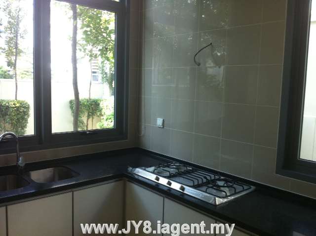 Marble top kitchen with a view of the Pool outside