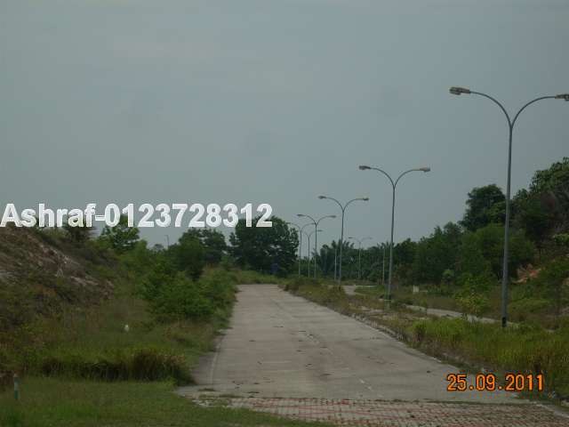 Road leading the the vacant lot