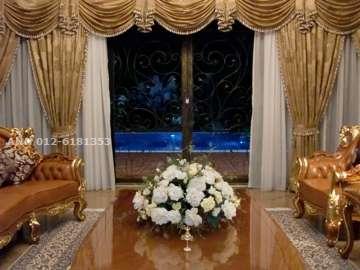LIVING HALL OVERLOOKING POOL
