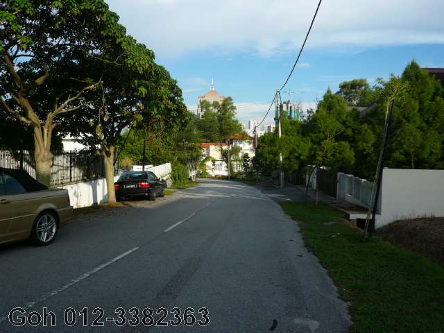 Road to left of land