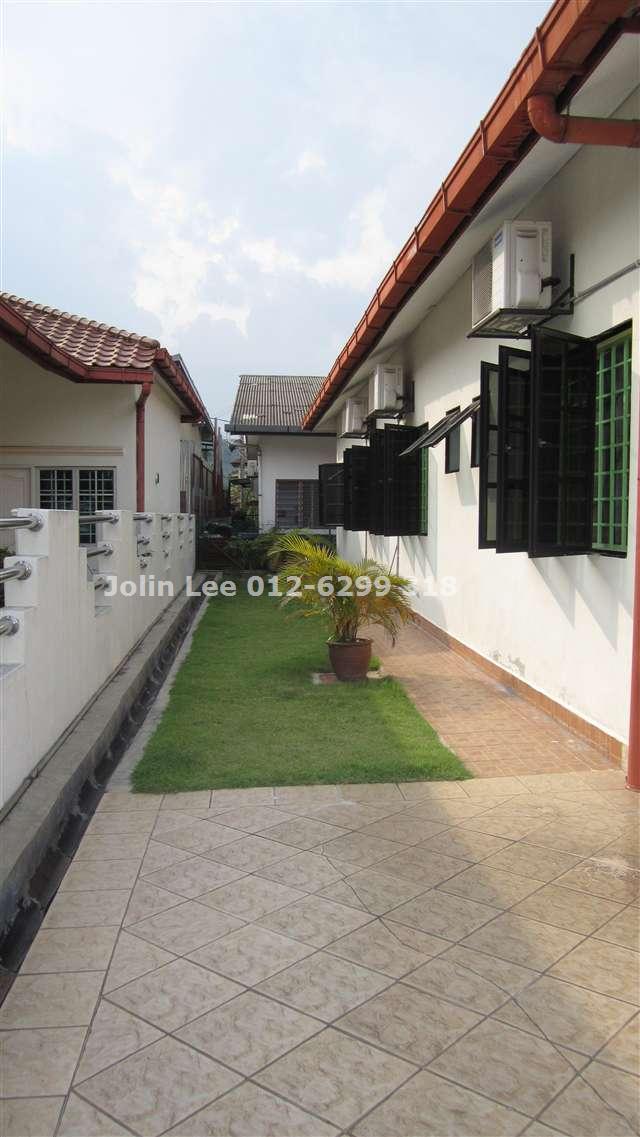Empty land on both side of the house