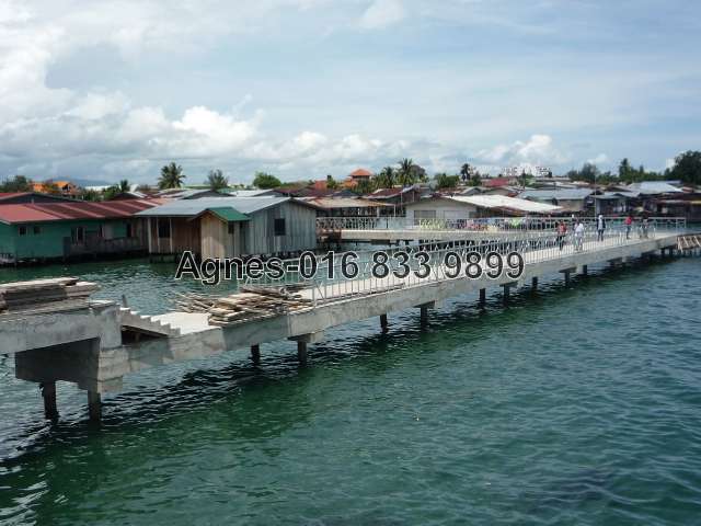 The land is at corner of bridge