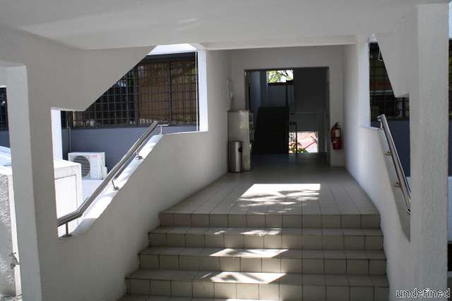 Stairway leading up to the condo