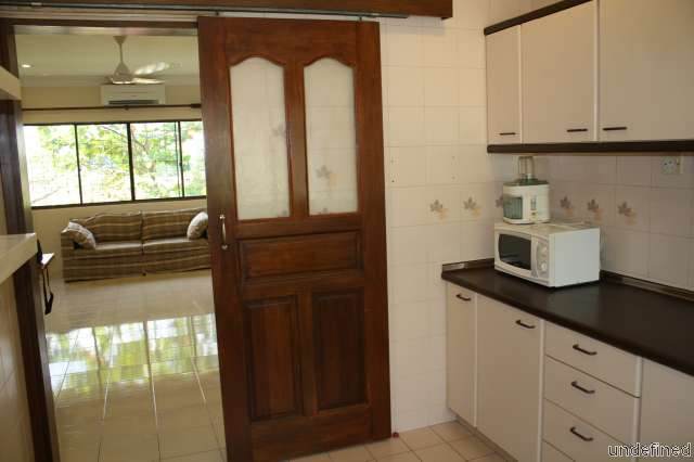 Kitchen looking out to the living area