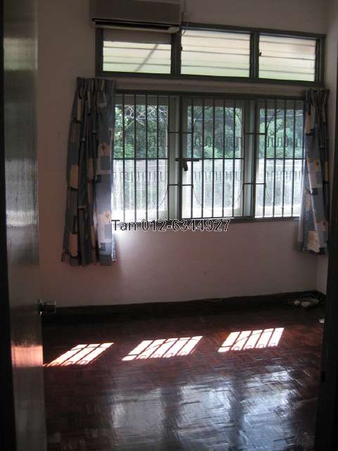 Third bedroom with view of trees